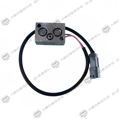 Komatsu 702-21-57600 – Solenoid, ktorý udržuje konštantnú magnetickú silu napriek zvýšeniu teploty cievky
